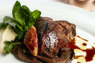 Roast grouse with game chips, watercress and bread sauce