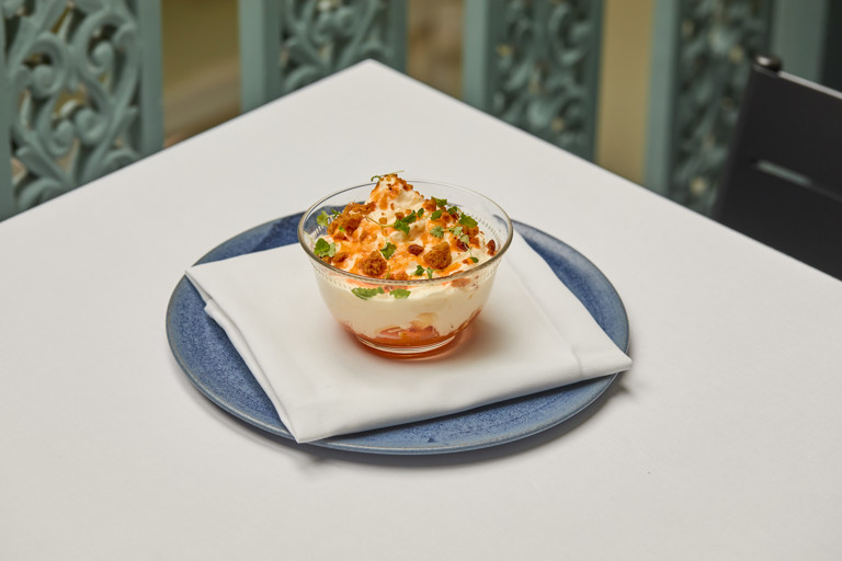 Buttermilk foam, carrot jam and flaked almonds