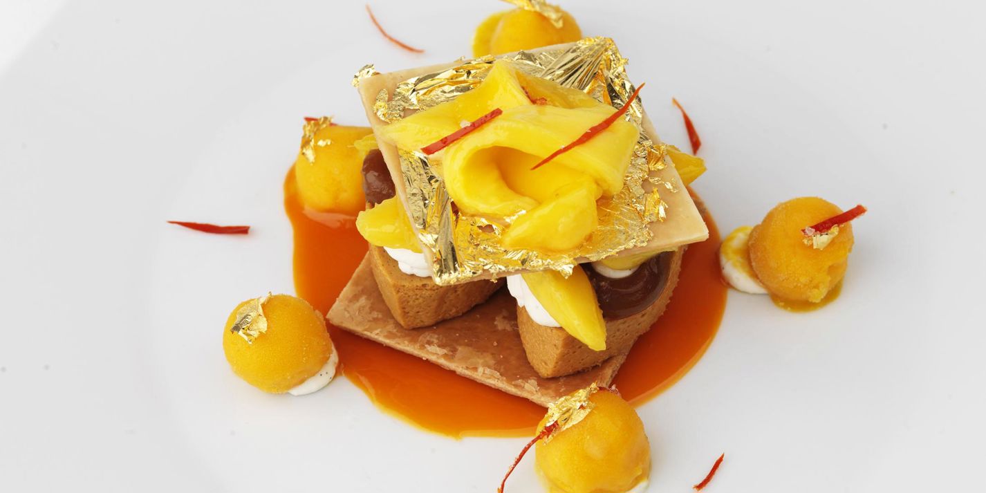 Caramel mille feuille, mango and gold leaf press and crystalised chilli