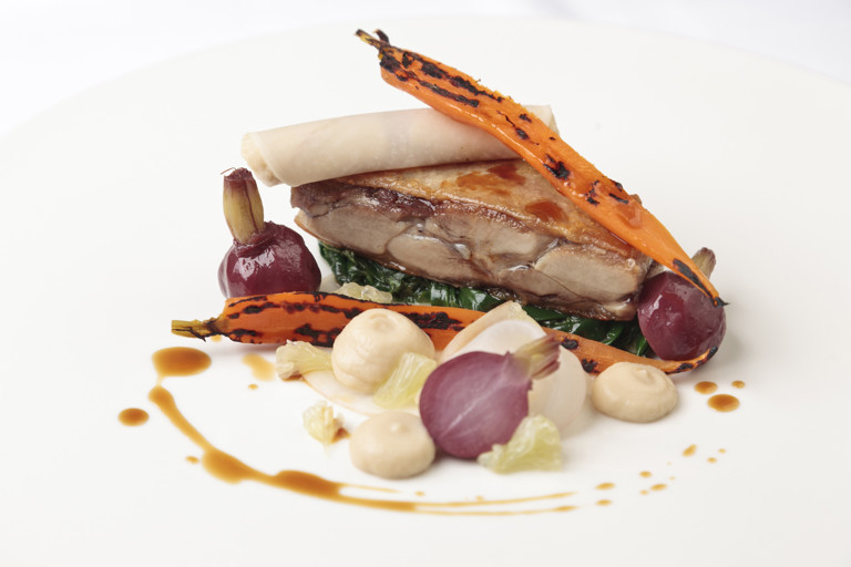 Steamed duck leg with glazed carrots, lemon and turnip 