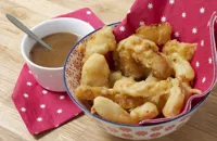 Pineapple fritters with five spice toffee dipping sauce