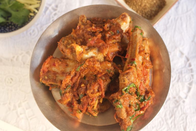 Afghani Style mutton chop karhai with pepper, coriander and cumin