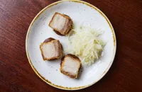 Crispy pork belly with brown sauce