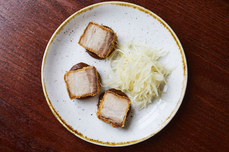 Crispy pork belly with brown sauce