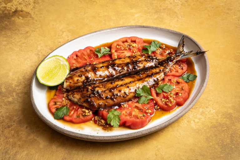 Grilled mackerel with tamarind and black pepper glaze and tomato salad