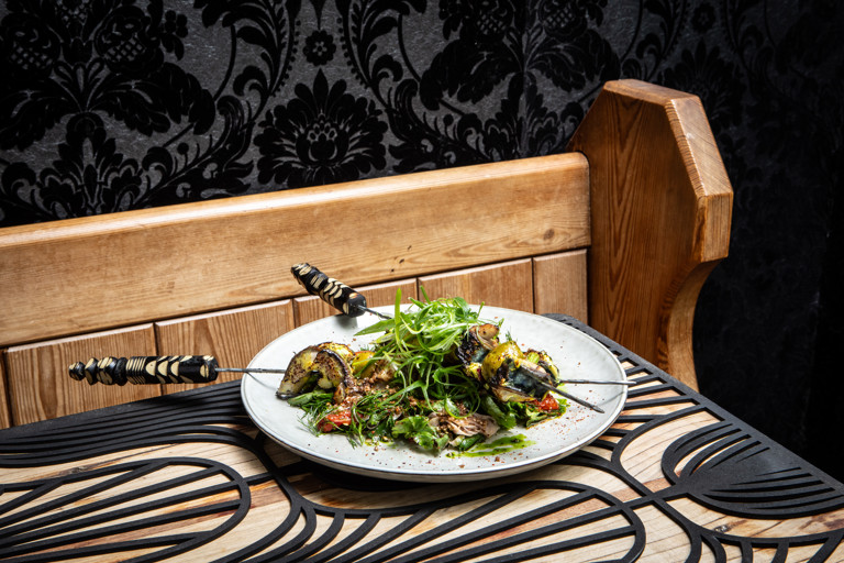 Amba-spiced mackerel skewers, green tarator, fennel and tomato salad