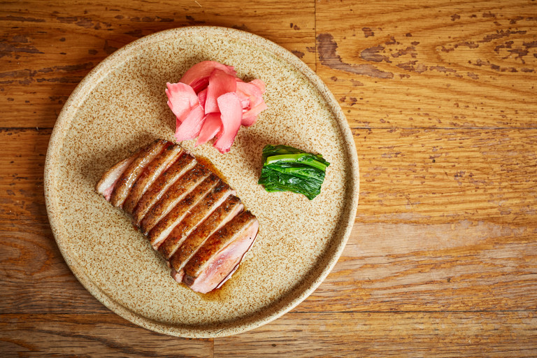 Grilled duck with burnt soy and rhubarb ginger pickle