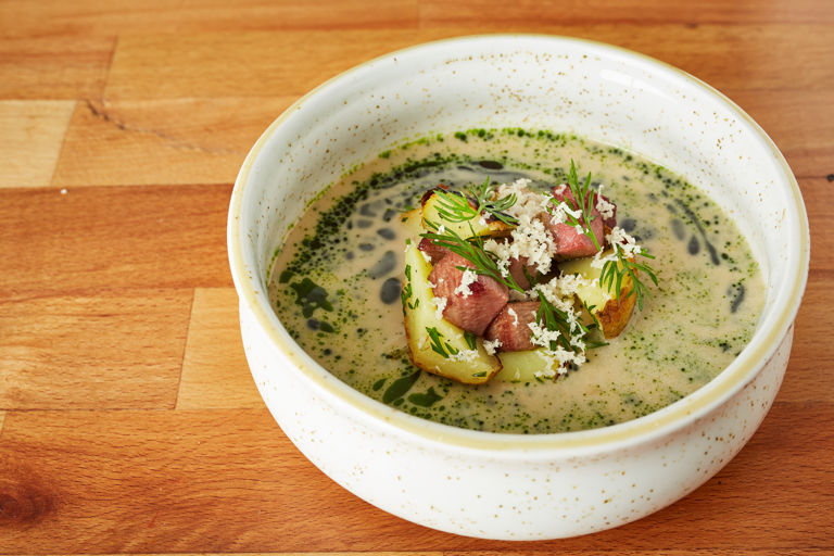 Sour rye soup with tongue, potatoes, dill and horseradish
