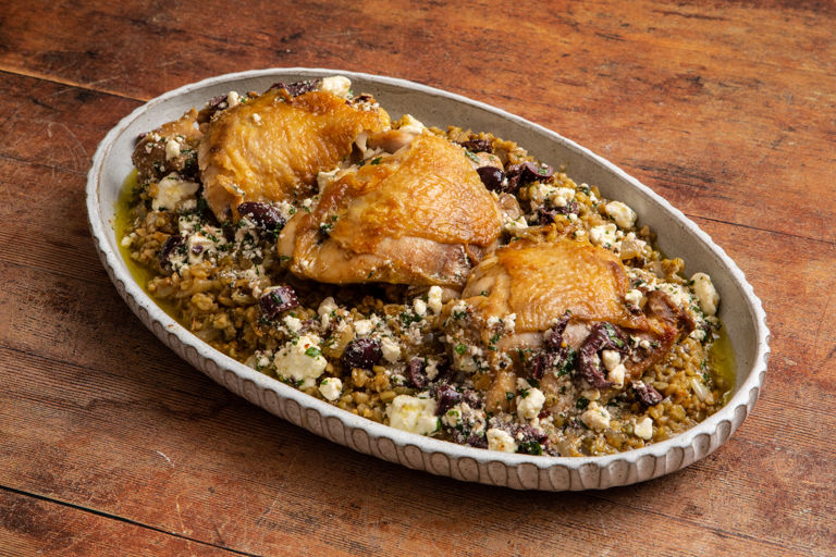 Roasted chicken thighs with freekeh and an olive and preserved lemon salsa