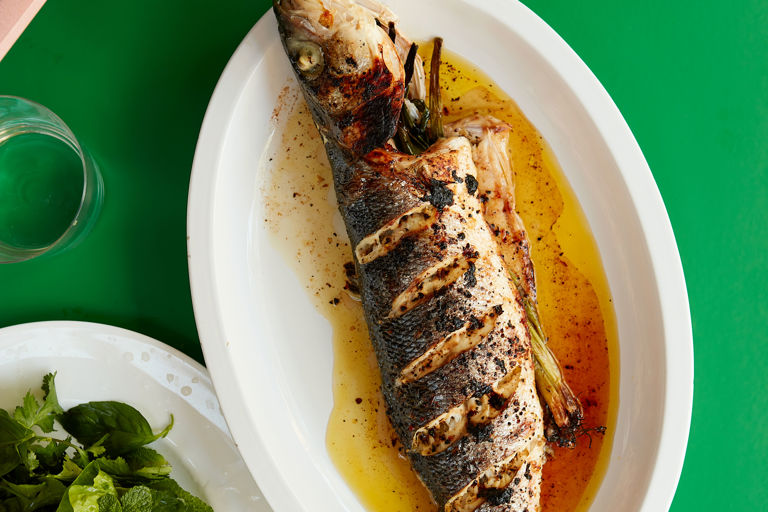 Brown butter sea bass with tangerine dipping sauce and lots of herbs