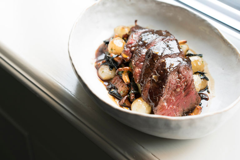 Grilled onglet with sautéed wild mushrooms, pancetta, potato purée and red wine sauce