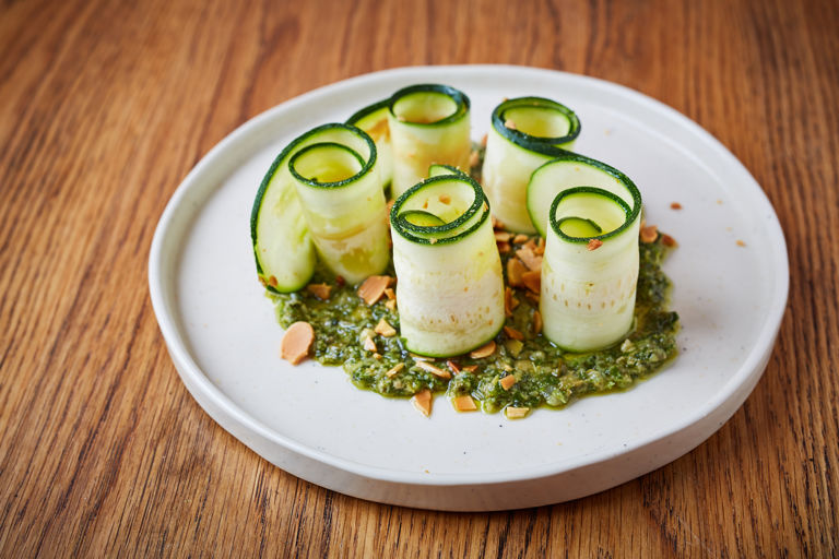 Marinated courgettes with salsa verde and toasted almonds