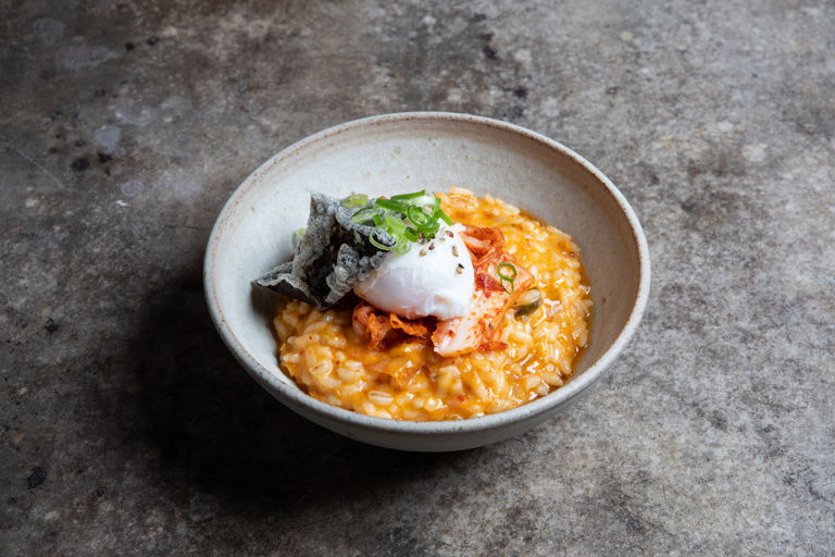 Kimchi risotto with a poached egg, cheddar and sesame