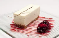 Vanilla cheesecake with red berry compote