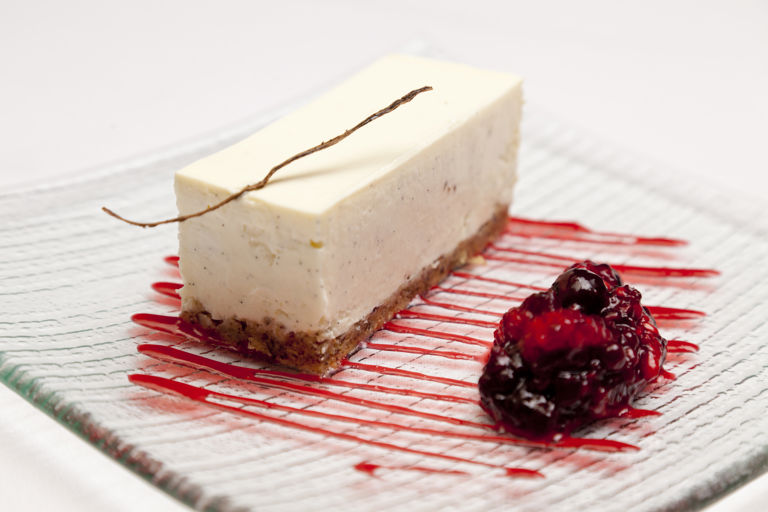 Vanilla cheesecake with red berry compote