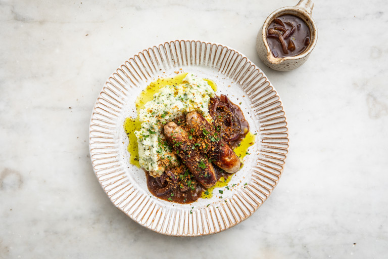 Caramelised onion bangers and herby buttermilk mash