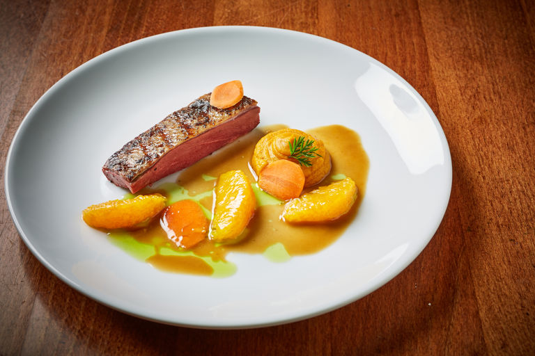 Five-spice smoked duck with carrots and orange