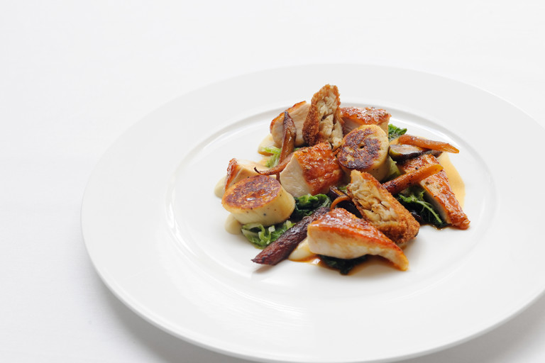 Guinea fowl with boudin blanc, savoy cabbage and white onion purée