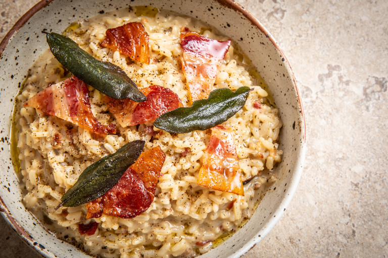 Mushroom risotto with crispy bacon and sage