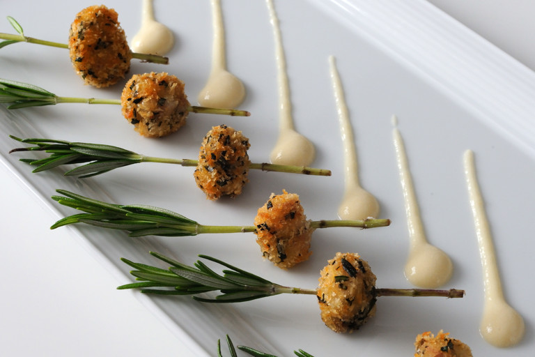 Beignet of veal sweetbreads with rosemary and onion cream