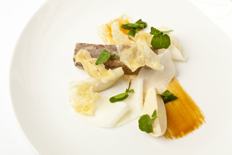 Pig's head terrine with parsnip toffee, pear, cumin and watercress