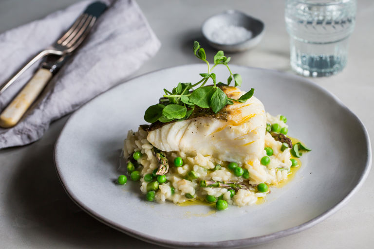 Pan-roasted cod with asparagus and pea risotto   