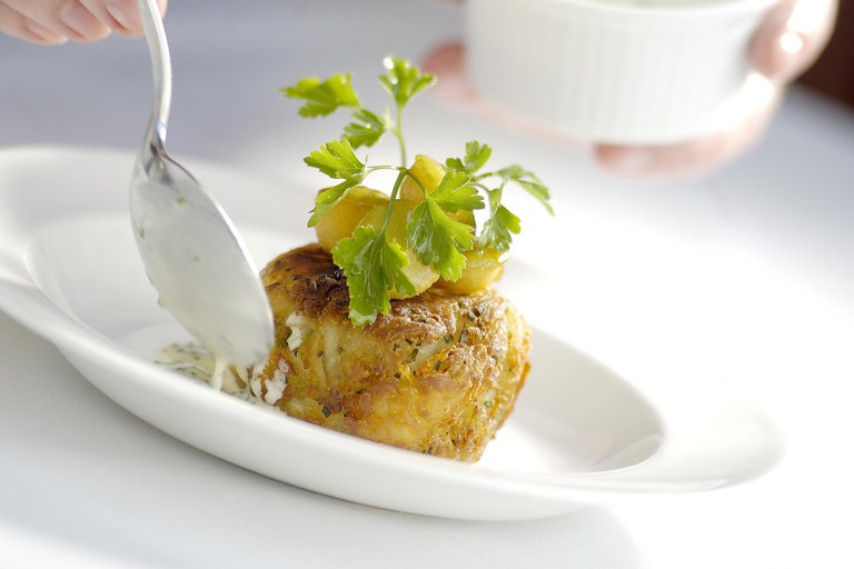 Black pudding and cheese hash browns with caramelised pear