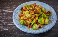 Charred sprouts with orange zest, chestnuts and pancetta