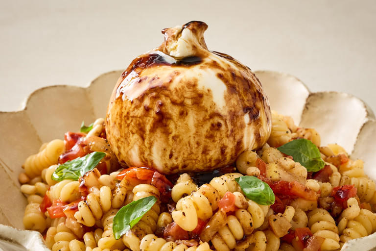 Fusilli bucati corti with raw tomato, peach and burrata