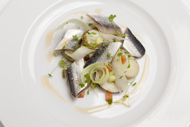 Soused herring with heritage potato, celery salad and bloody Mary sauce