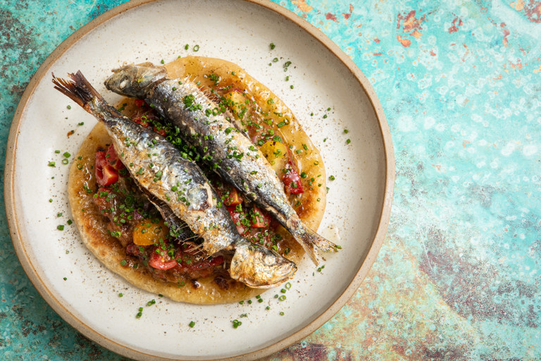Grilled sardines with flatbread and red pepper date chutney