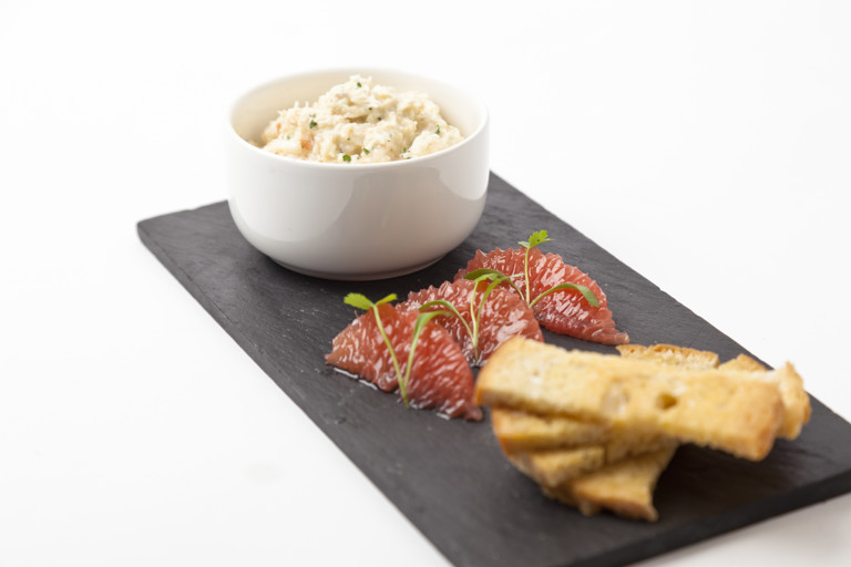 Cornish crab with pink grapefruit mayonnaise on wholemeal toasts