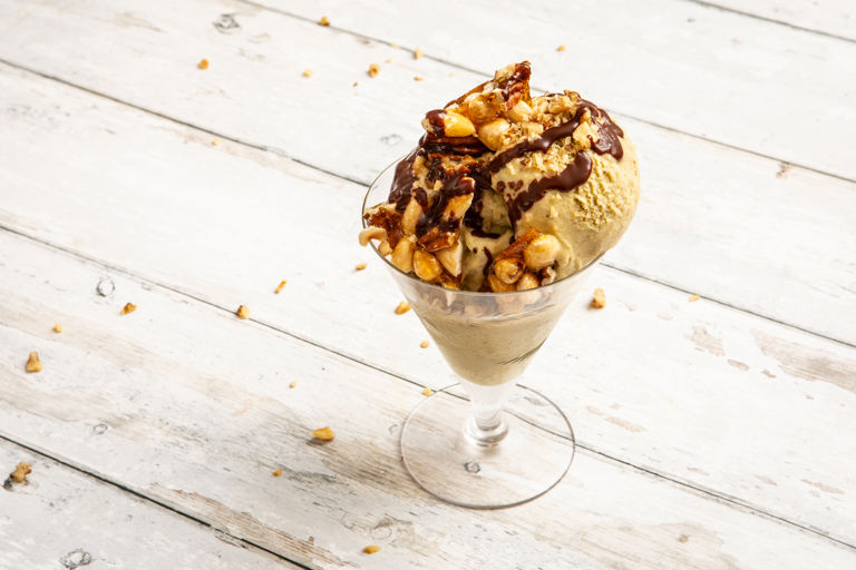 Honey and pistachio gelato with caramelised nuts and dark chocolate drizzle