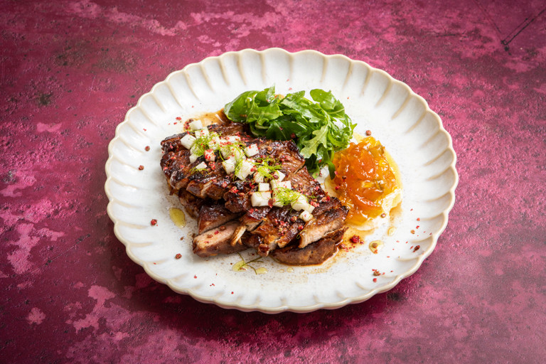 Grilled pork shoulder steaks with fennel and apricot jam and pickled kohlrabi