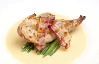 Rabbit with mustard sauce and bacon