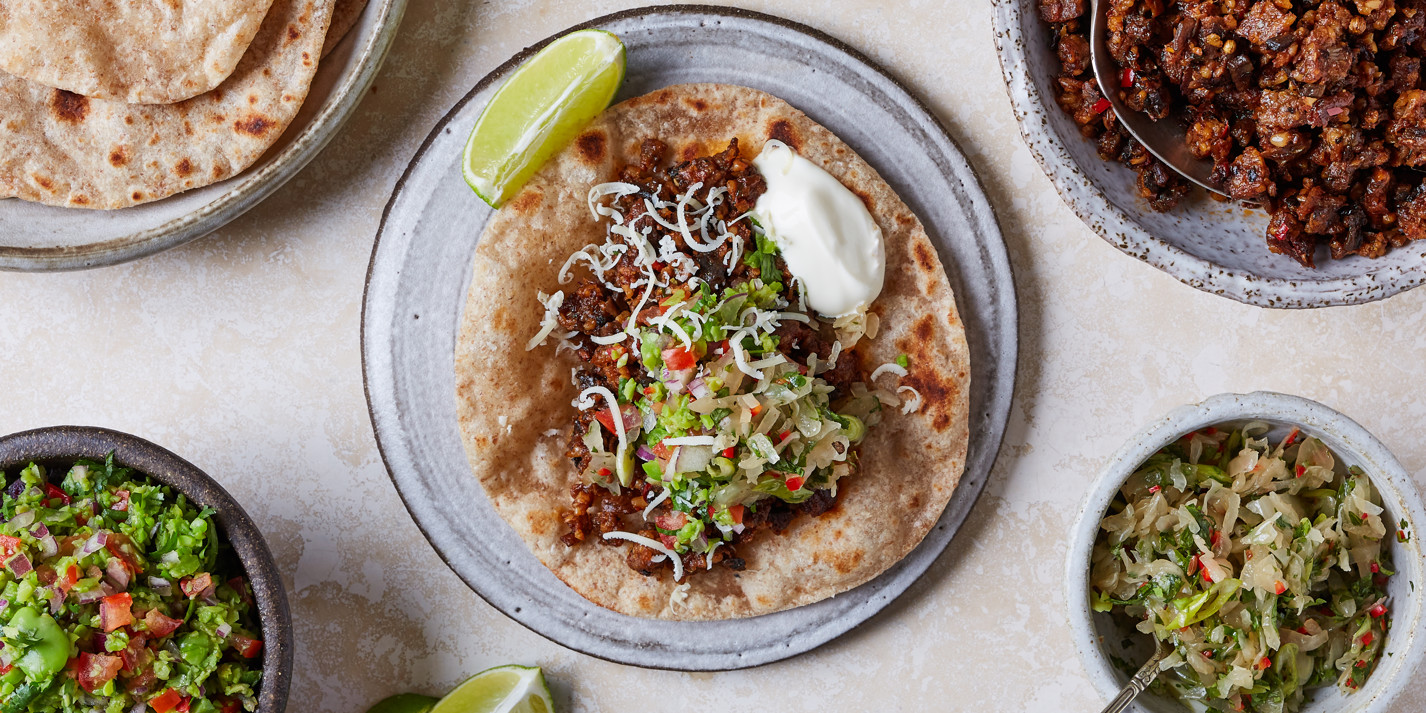 image of White Pudding Tacos With Broad Bean Guacamole and Sauerkraut Slaw recipe by Great British Chefs