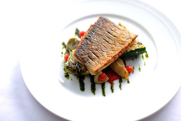 Griddled South Coast sea bass with provençal vegetables and basil oil