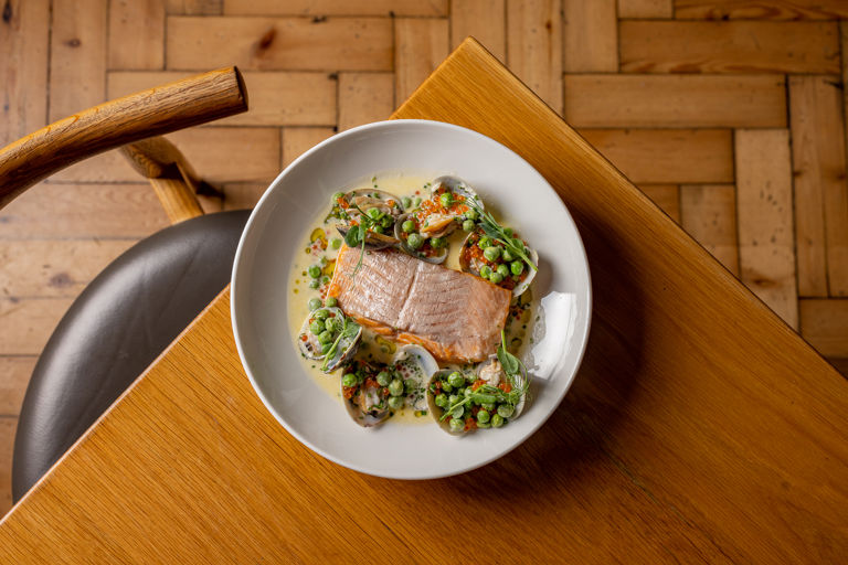 Fillet of chalk stream trout with clams, peas and crème fraîche