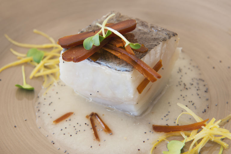 Confit cod with onion sauce and mullet roe