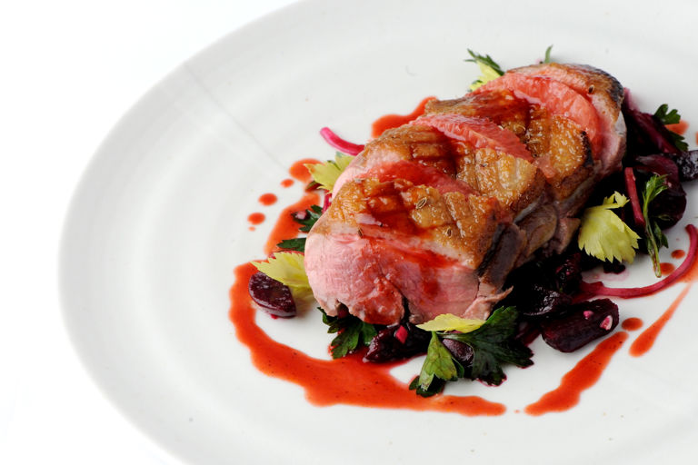 Duck breast with honey, caraway and beetroot and grapefruit salad