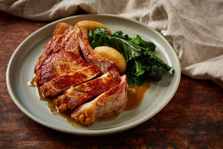 Pork chop, cider cream sauce, caramelised apples, thyme