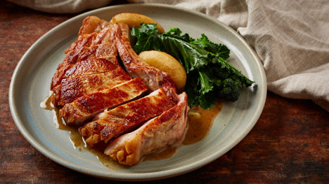 Pork chop, cider cream sauce, caramelised apples, thyme