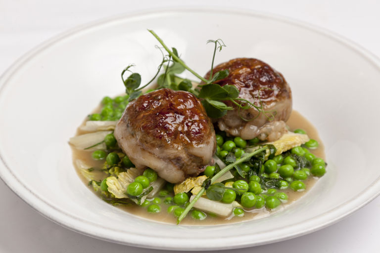 Ale-braised mutton and kidney faggots with peas, lettuce and mint