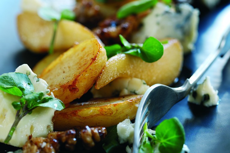 Roast Jersey Royals with glazed pear, Roquefort cheese and walnut salad