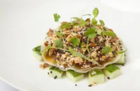 Pulled pork and chorizo ‘raviolo’, pickled cucumber, sesame, peanut and green chilli