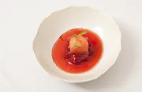 Raspberry soup with raspberry jelly and milk ice cream
