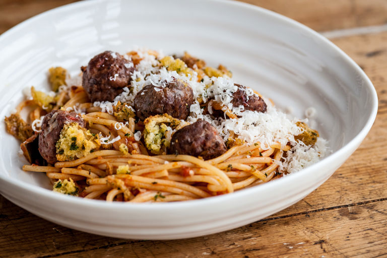 Spaghetti and meatballs with mini garlic bites