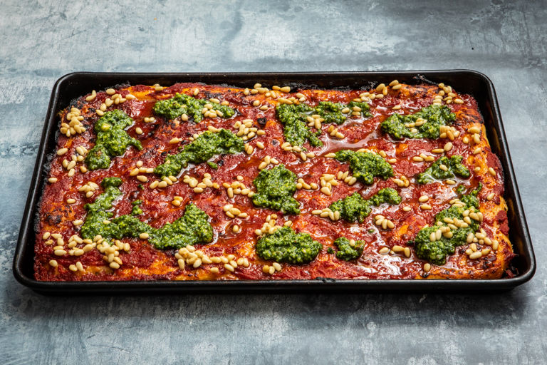 Sicilian style pizza with buttered pine nuts and watercress pesto 