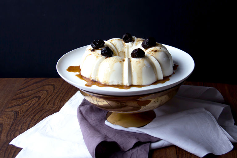 Coconut pudding with prune sauce