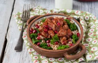 Spelt with kale, pulled beef and pomegranate seeds
